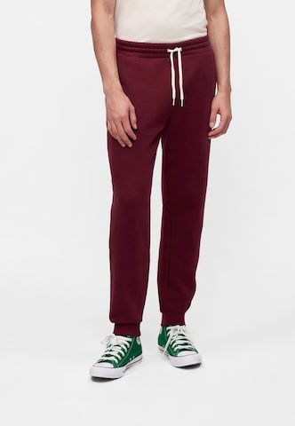 Tapered Pantaloni 'CHUCK' di CONVERSE in rosso: frontale
