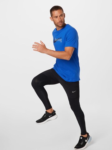 NIKE Regular fit Funktionstopp i blå