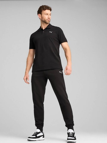 PUMA - regular Pantalón deportivo 'Puma Ess Sweatpants Fl Cl' en negro