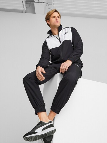 PUMA Sweatjacke‌‌‌‌‌ in Schwarz