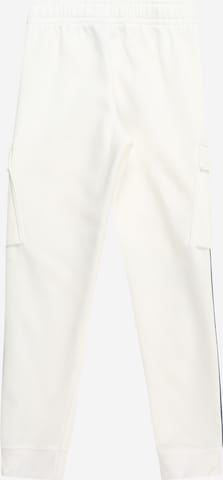 Effilé Pantalon 'AIR' Nike Sportswear en blanc