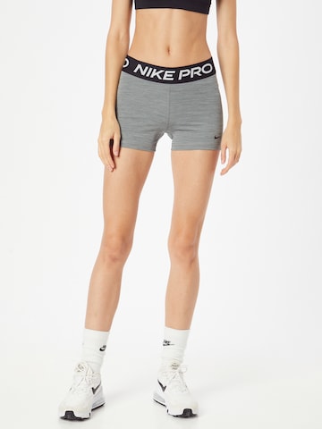 Skinny Pantalon de sport 'Pro' NIKE en gris : devant