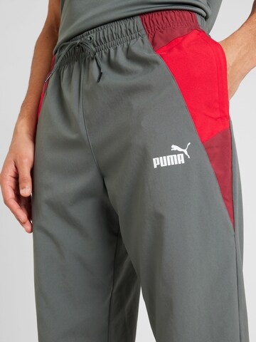 PUMA Tapered Sportbroek in Grijs