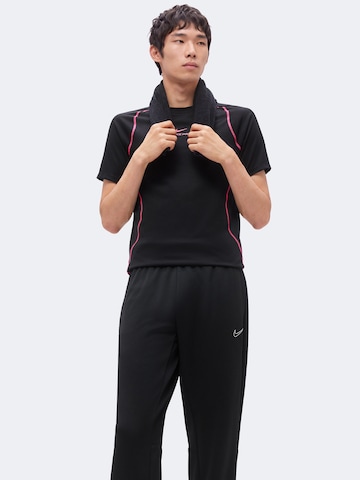 Effilé Pantalon de sport 'Flex' NIKE en noir