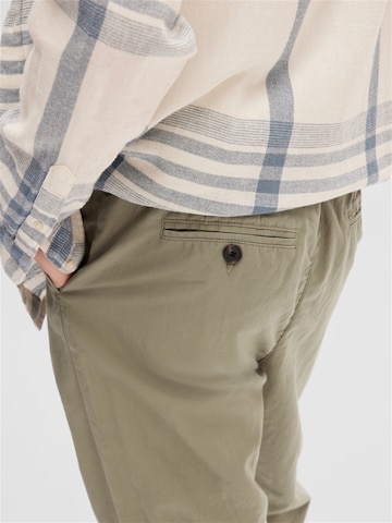 SELECTED HOMME جينز واسع سراويل من القماش القطني بلون أخضر