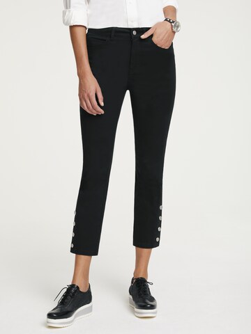 Skinny Pantaloni de la heine pe negru: față