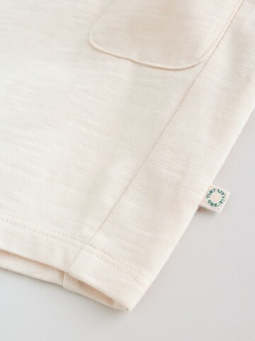 Next Strampler in Beige