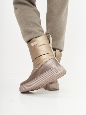 CESARE GASPARI - Botas de neve em ouro