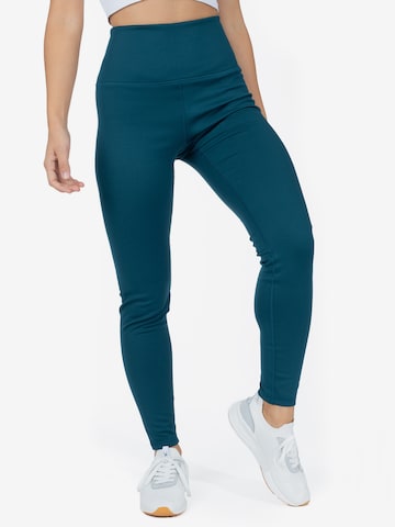 Skinny Pantaloni sportivi di Spyder in verde