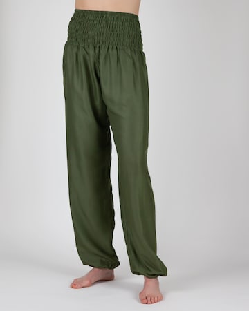 Paigh Regular Harem trousers in Green: front