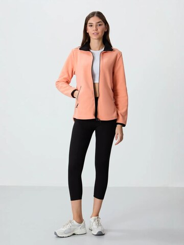 Tommy Life Bluza polarowa w kolorze pomarańczowy