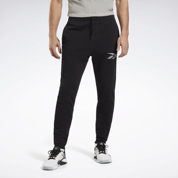 Reebok Tapered Workout Pants in Black: front