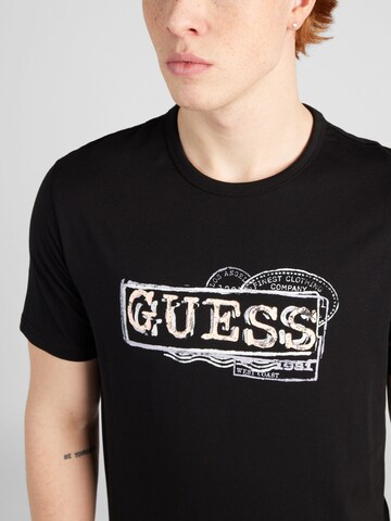 GUESS - Camiseta en negro