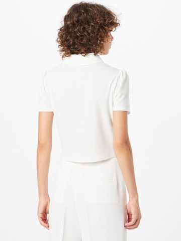 River Island - Blusa en blanco