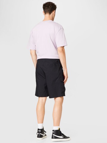 Nike Sportswear Ohlapna forma Kargo hlače | črna barva