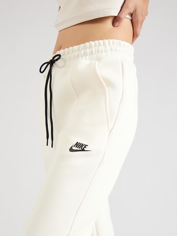 Nike Sportswear Дънки Tapered Leg Панталон в бежово