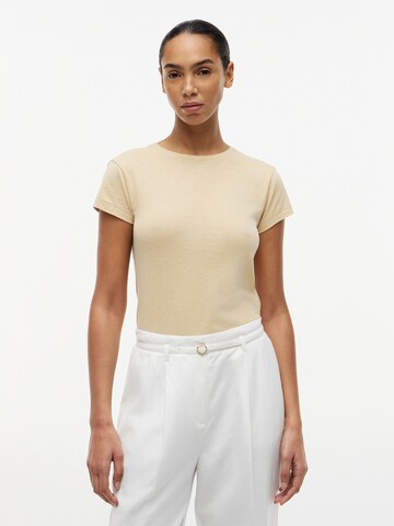 TOMMY HILFIGER T-shirt i beige: framsida