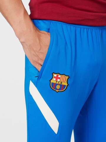 NIKE Слим фит Спортен панталон 'FC Barcelona Strike' в синьо