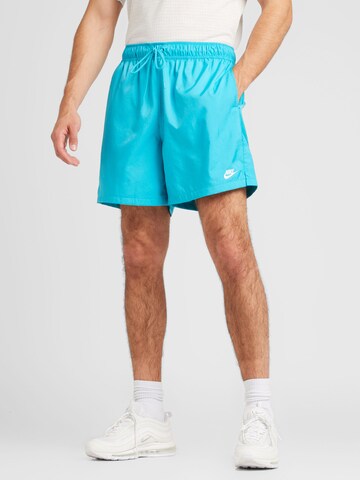 Loosefit Pantalon 'Club' Nike Sportswear en bleu : devant