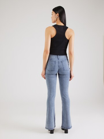 Free People Расклешенный Джинсы в Синий