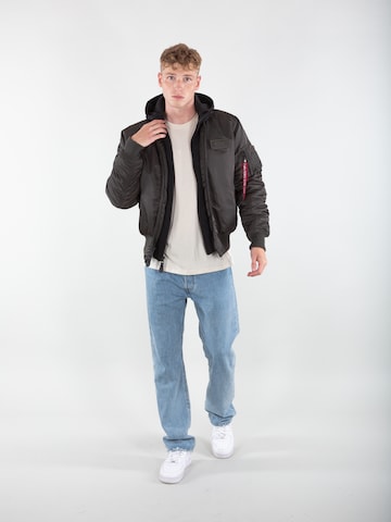 ALPHA INDUSTRIES Välikausitakki 'MA-1 D-Tec' värissä vihreä