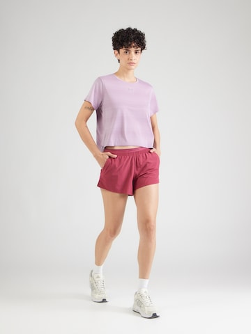 UNDER ARMOUR - regular Pantalón deportivo 'Vanish' en rojo