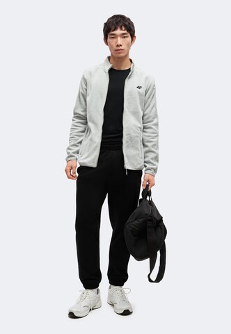 Tapered Pantaloni sport de la 4F pe negru