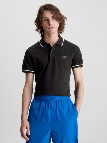 Calvin Klein Jeans Poloshirt in Schwarz: predná strana