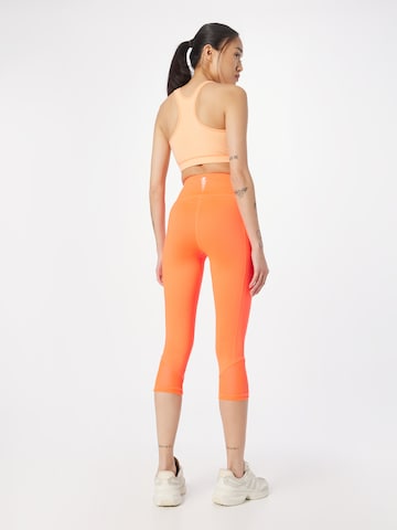 Champion Authentic Athletic Apparel Skinny Workout Pants in Orange