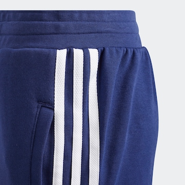 ADIDAS ORIGINALS Tapered Broek 'Trefoil' in Blauw