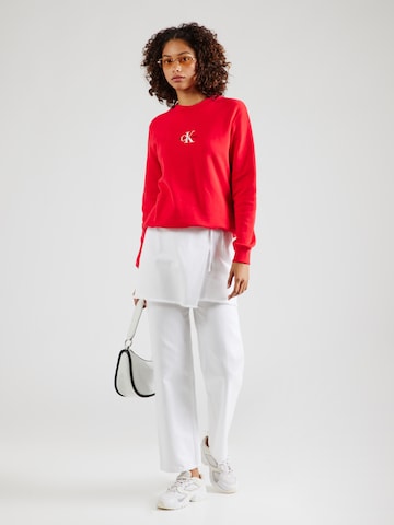 Sweat-shirt Calvin Klein Jeans en rouge