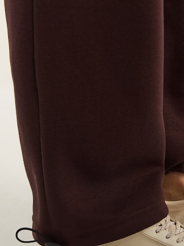 Bianco Lucci Loose fit Trousers in Brown