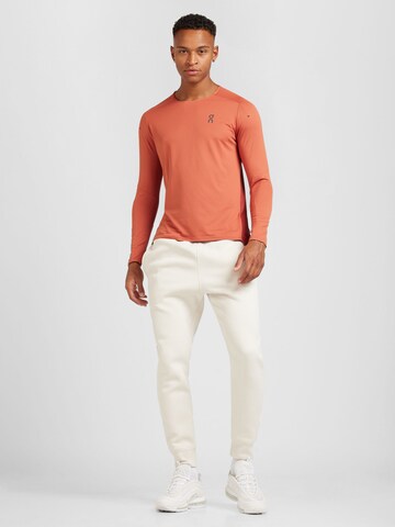 Tapered Pantaloni 'Club Fleece' de la Nike Sportswear pe bej