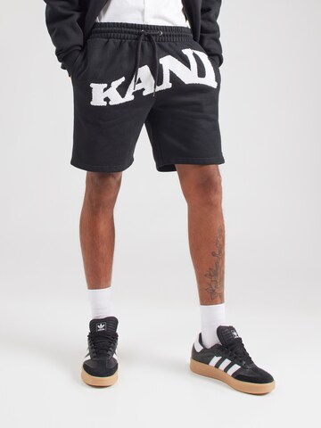 Karl Kani Regular Trousers in Black: front