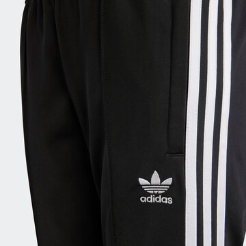 ADIDAS ORIGINALS Flared Pants '3-Stripes ' in Black