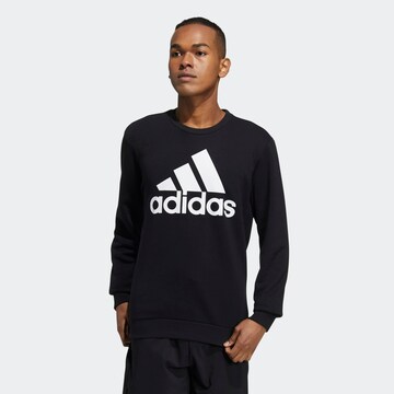 ADIDAS SPORTSWEAR Αθλητική μπλούζα φούτερ 'Essentials' σε μαύρο: μπροστά