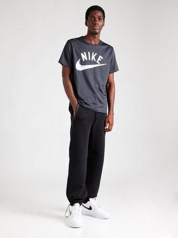Nike Sportswear Tapered Broek 'TECH FLEECE' in Zwart
