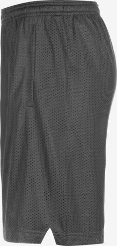 Loosefit Pantaloni sportivi di UNDER ARMOUR in grigio