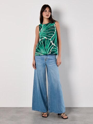 Haut Apricot en vert