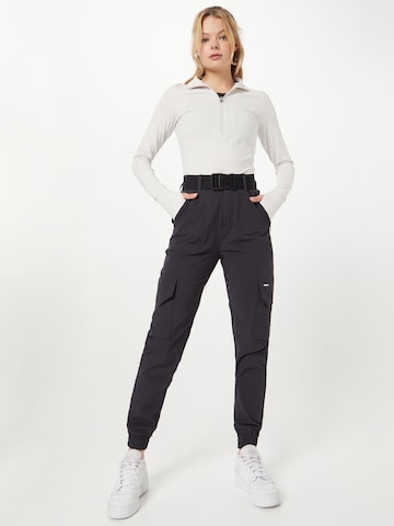 aim'n Tapered Sportbroek in Zwart