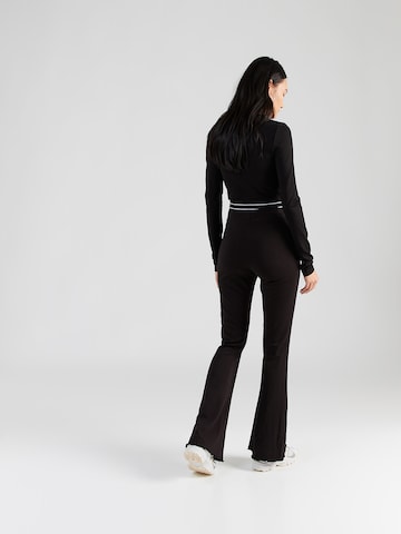 évasé Pantalon Tommy Jeans en noir