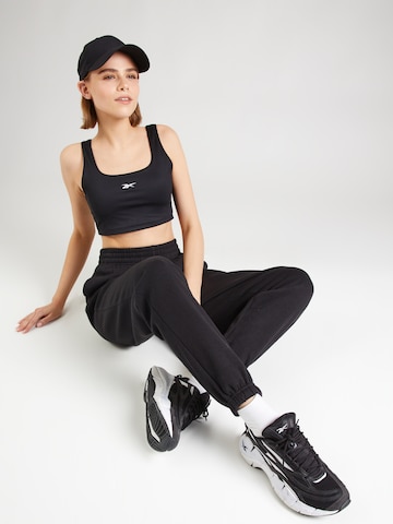 Reebok Tapered Sportbroek 'RIE' in Zwart