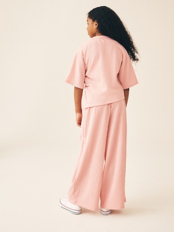 Set Next en rose
