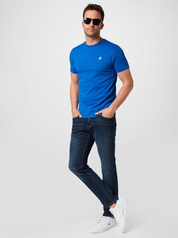 Superdry Koszulka funkcyjna w kolorze niebieski