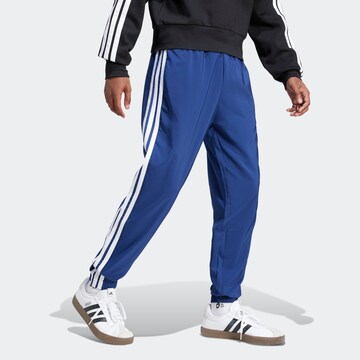 ADIDAS SPORTSWEAR Tapered Sports trousers in Blue