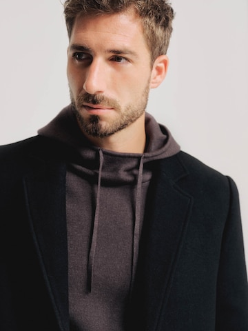 ABOUT YOU x Kevin Trapp Between-Seasons Coat 'Julian' in Black