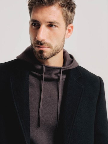 Manteau mi-saison 'Julian' ABOUT YOU x Kevin Trapp en noir