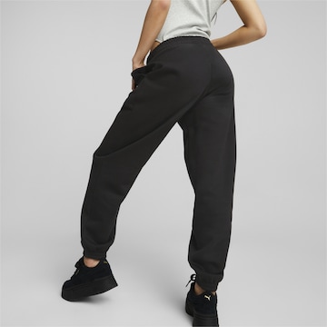 PUMA - Tapered Pantalón deportivo en negro