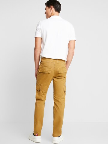 žalia ALPHA INDUSTRIES Standartinis Laisvo stiliaus kelnės 'Agent'