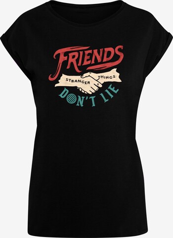 ABSOLUTE CULT Shirt 'Stranger Things - Friends Dont Lie Hands' in Zwart: voorkant